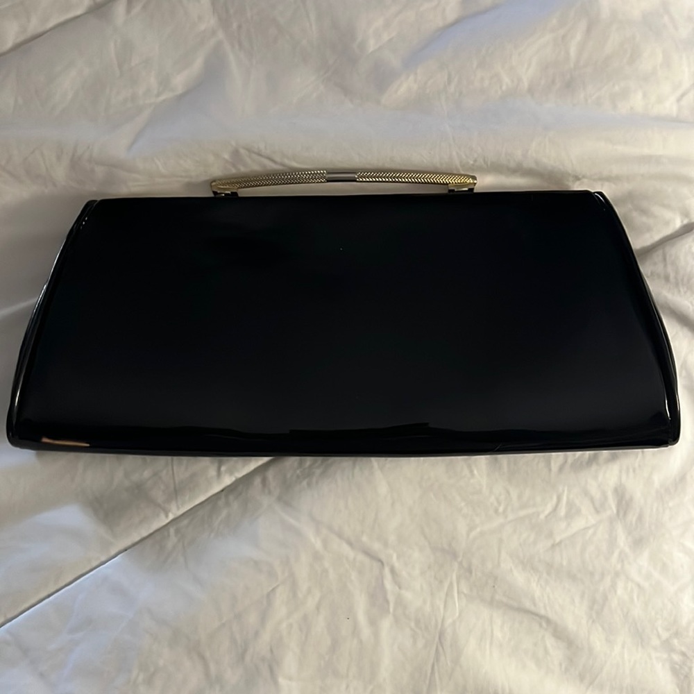 Vintage black patent leather clutch.